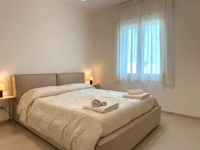 Camera da letto con finestra, appartamento Borea Otranto